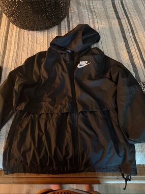 Nike Black Hooded Windbreaker with White Swoosh